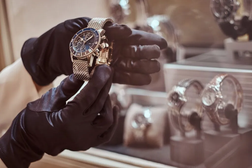 A jeweler showing a men's watch